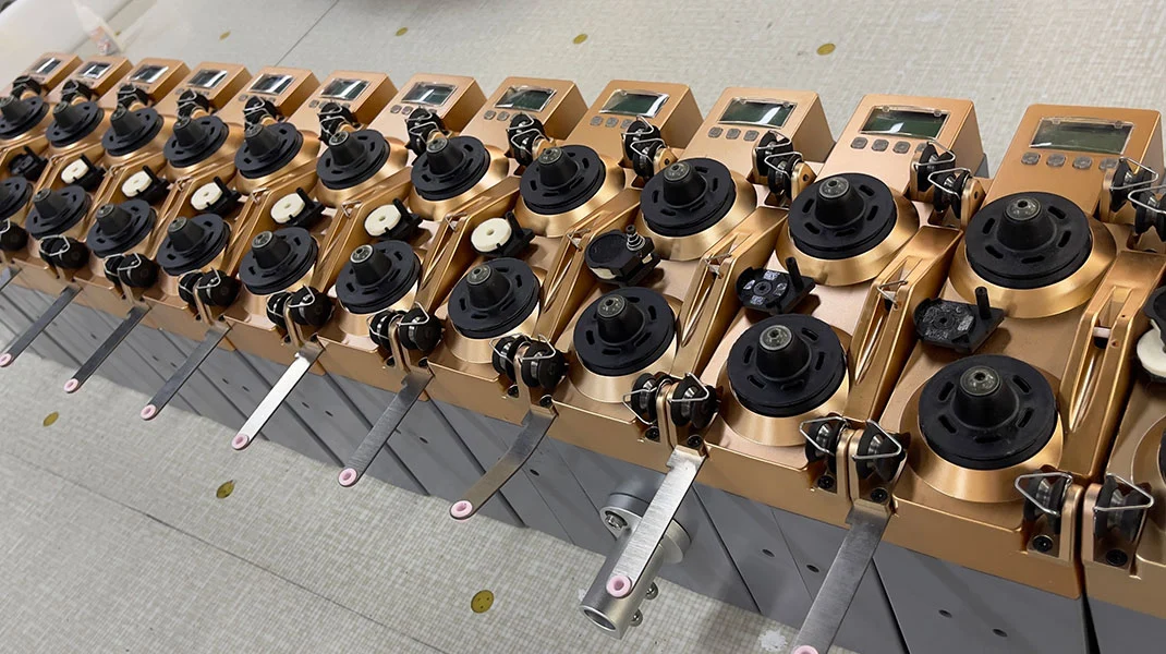 Navíjecí strojové příslušenství